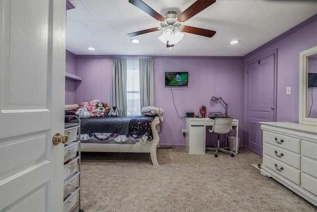 bedroom with baseboards, light carpet, ceiling fan, and crown molding