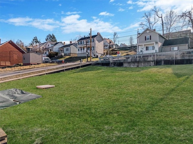 view of yard with a residential view