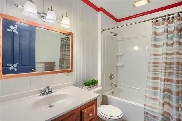 bathroom featuring vanity, toilet, and shower / tub combo