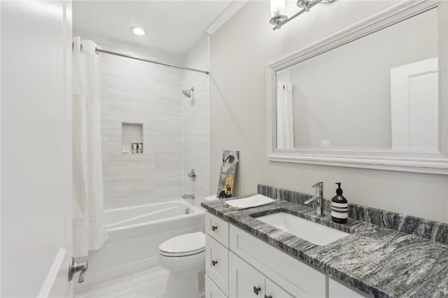 full bathroom featuring vanity, toilet, and shower / tub combo with curtain