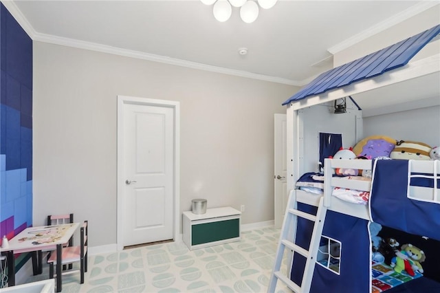 bedroom featuring crown molding and baseboards