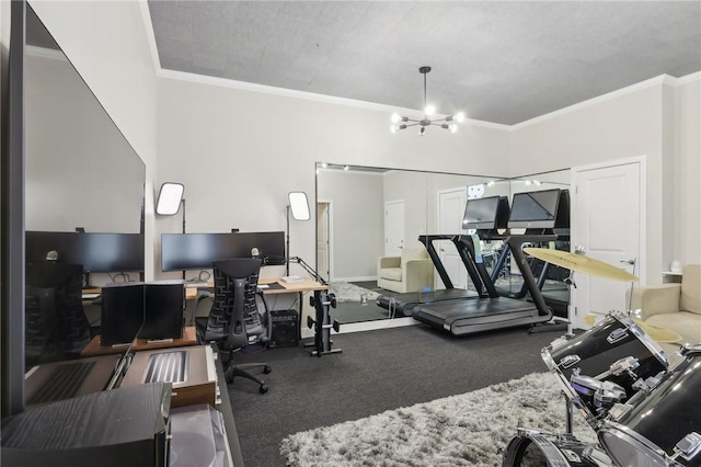 exercise area with a chandelier and ornamental molding