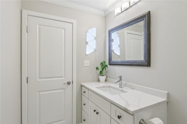 bathroom featuring vanity and crown molding