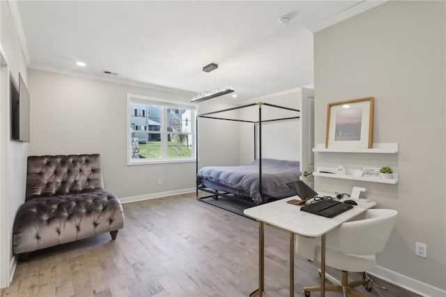 bedroom featuring visible vents, crown molding, baseboards, recessed lighting, and wood finished floors