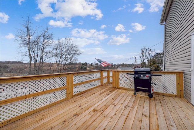 wooden deck with area for grilling