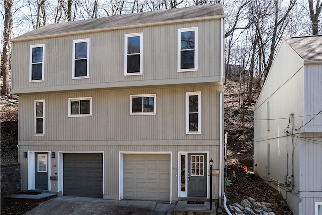 view of front of home with a garage