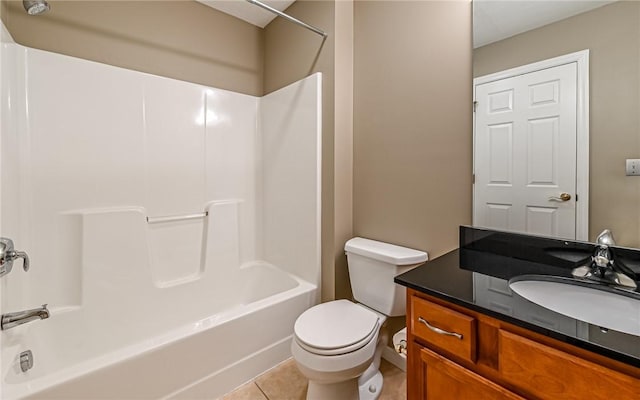 bathroom featuring tile patterned floors, toilet, vanity, and bathtub / shower combination