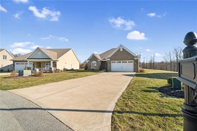 view of front of house with a front lawn, an attached garage, brick siding, and driveway