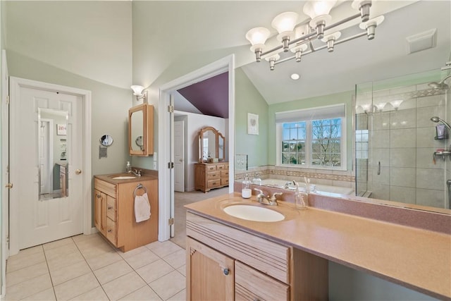 full bath featuring tile patterned floors, a garden tub, a stall shower, vanity, and vaulted ceiling