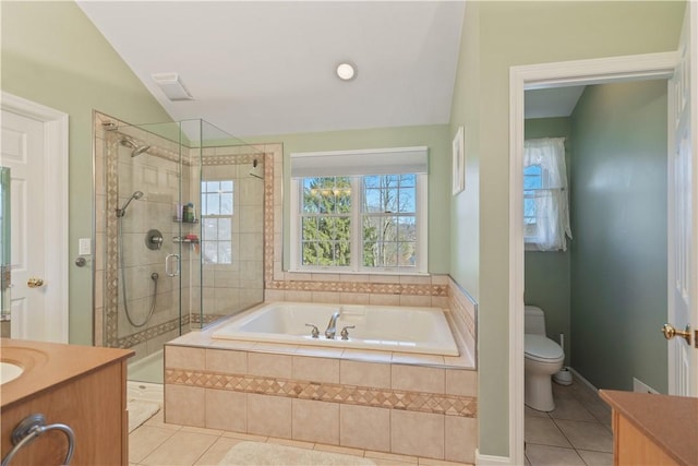 full bathroom with a garden tub, toilet, a shower stall, tile patterned flooring, and vanity