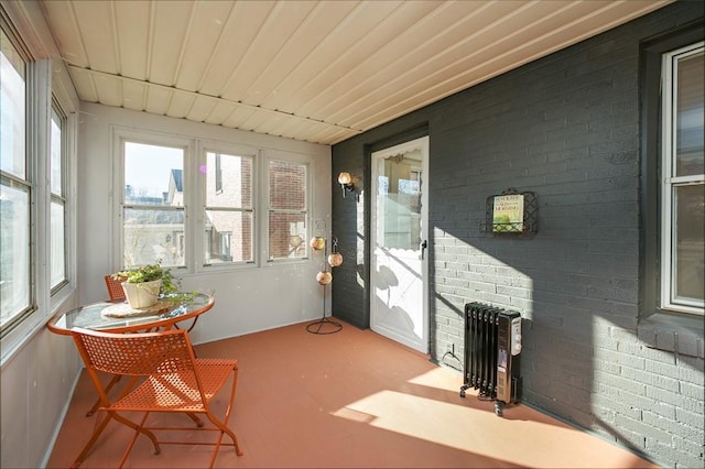 sunroom / solarium with radiator heating unit