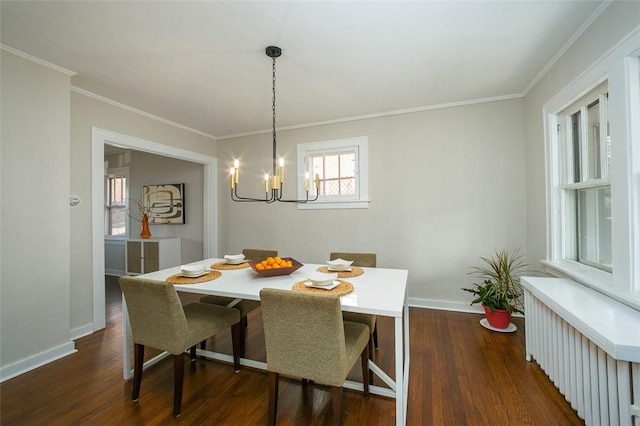 dining area with radiator heating unit, dark wood-style flooring, and ornamental molding