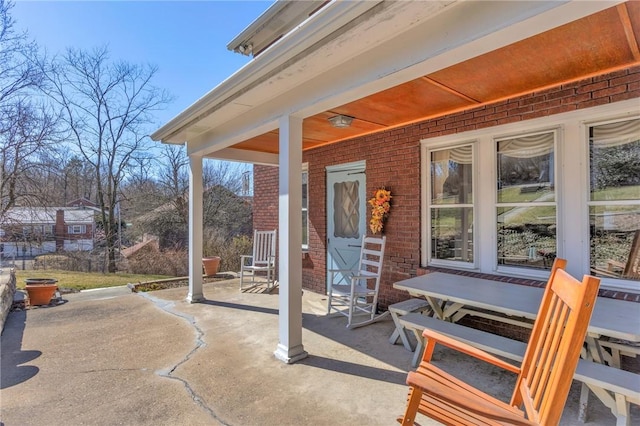 view of patio featuring a porch