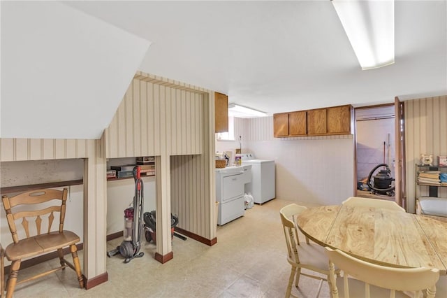 kitchen with brown cabinetry, light floors, and independent washer and dryer