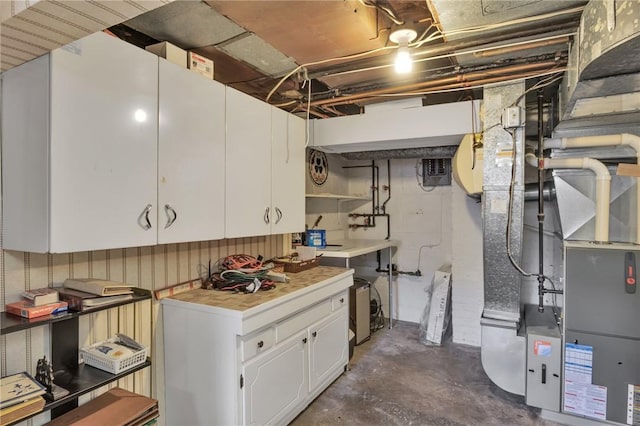 unfinished basement with heating unit