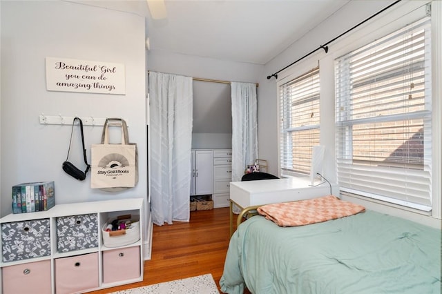 bedroom with wood finished floors