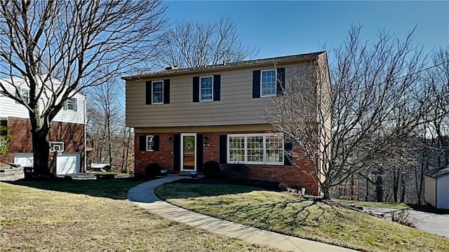 colonial house featuring brick siding and a front lawn