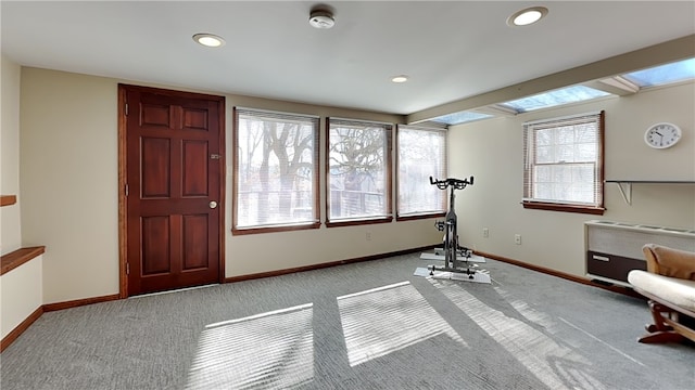 workout room featuring recessed lighting, baseboards, and carpet floors