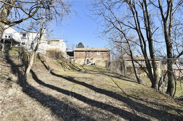 view of yard featuring fence