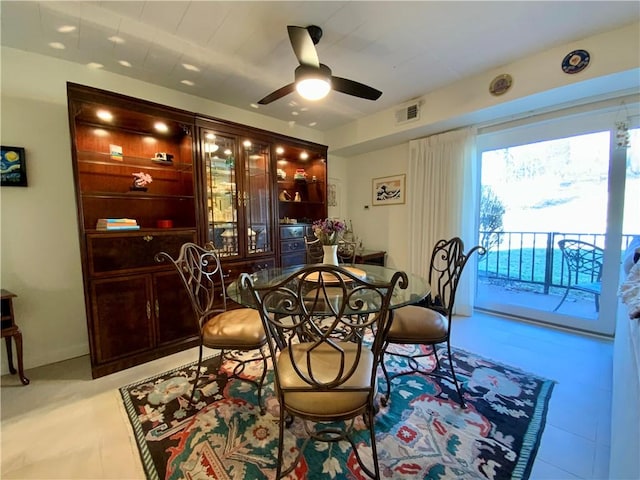 dining room featuring visible vents and ceiling fan