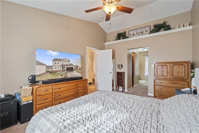 bedroom featuring light colored carpet, ceiling fan, baseboards, and vaulted ceiling