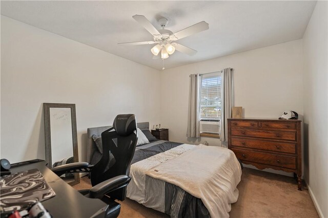 bedroom with a ceiling fan, cooling unit, carpet, and baseboards