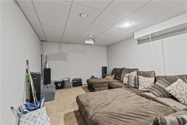 living room featuring recessed lighting, a paneled ceiling, and carpet