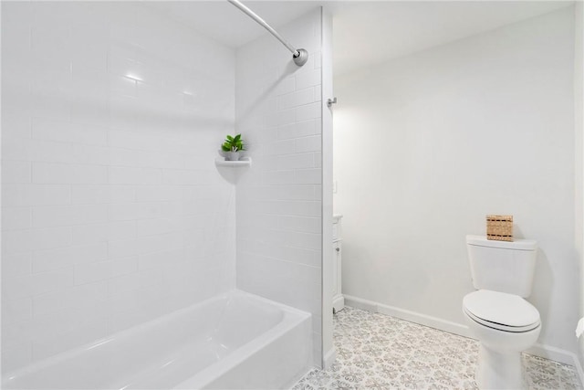 full bathroom featuring toilet, shower / bath combination, and baseboards