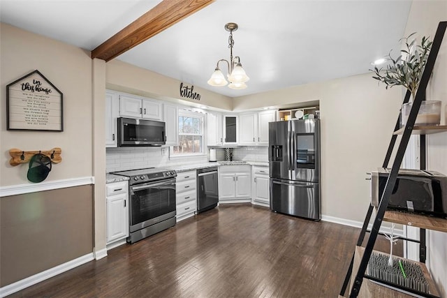 kitchen featuring white cabinetry, backsplash, and appliances with stainless steel finishes