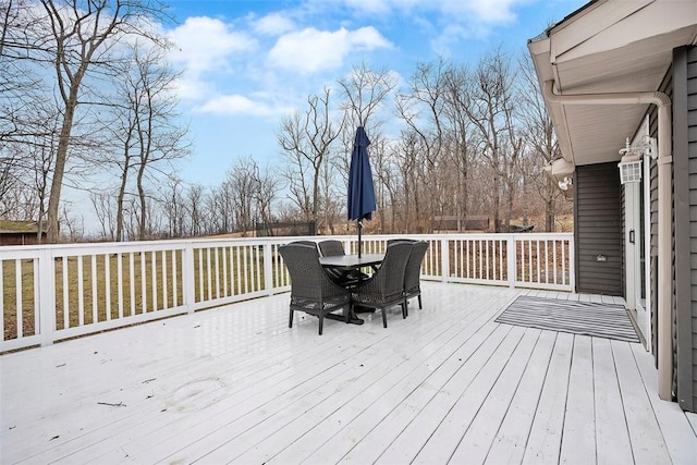 deck featuring outdoor dining area