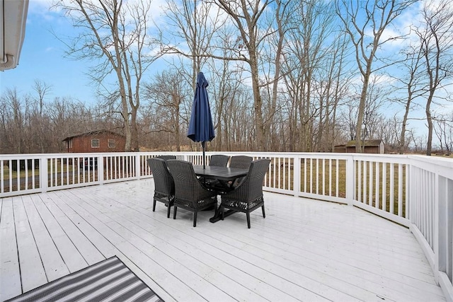 deck featuring outdoor dining space