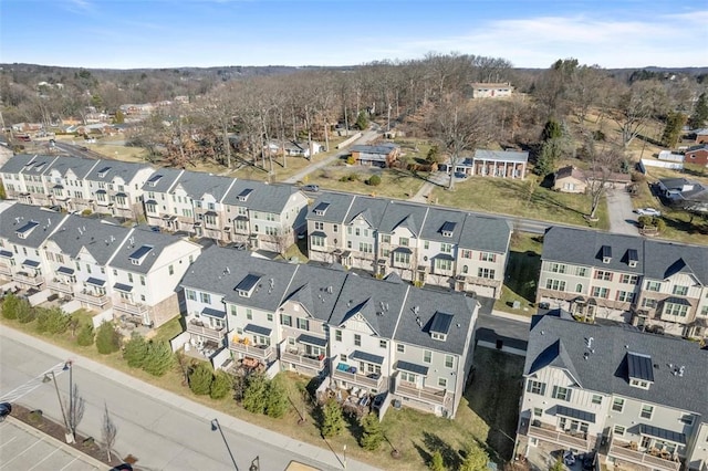 birds eye view of property with a residential view