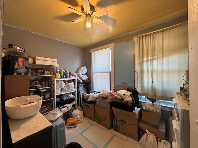 storage area featuring a ceiling fan