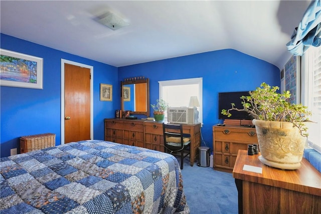 carpeted bedroom featuring cooling unit and vaulted ceiling