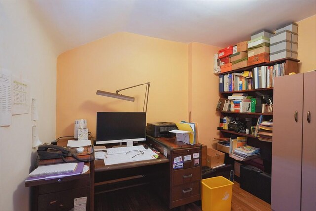 home office with wood finished floors