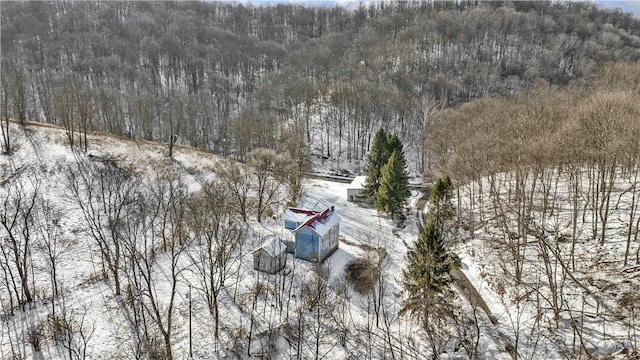 aerial view featuring a view of trees