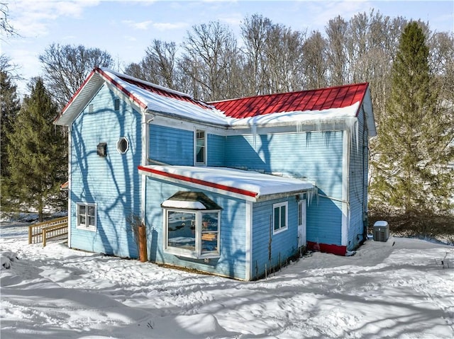 view of front of home featuring metal roof