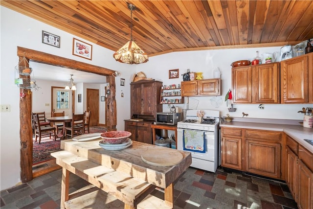 kitchen featuring pendant lighting, brown cabinetry, light countertops, white range with gas stovetop, and wood ceiling