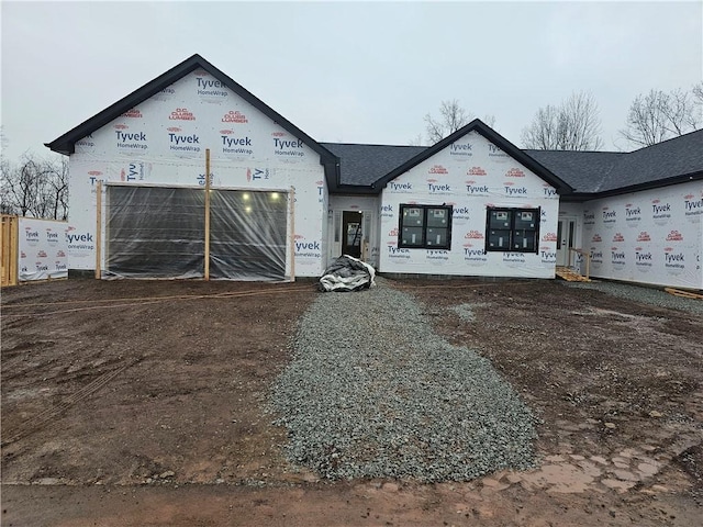 property under construction featuring an attached garage