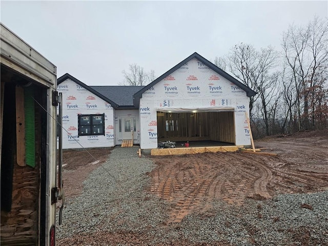 view of front of property featuring driveway and an attached garage