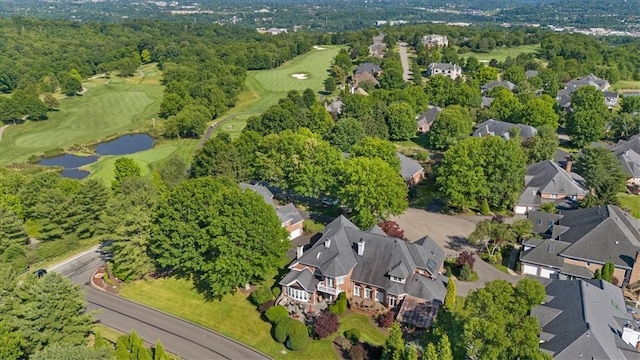 birds eye view of property with a residential view, golf course view, and a water view