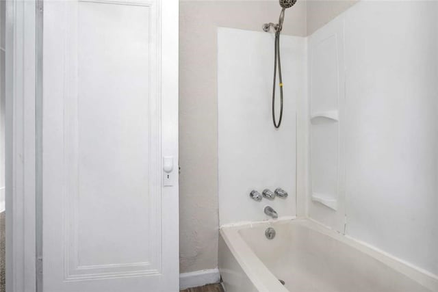 full bathroom featuring  shower combination