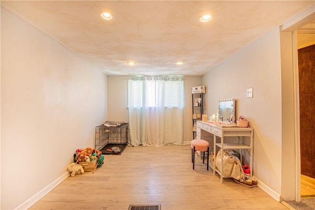 playroom featuring visible vents, recessed lighting, light wood-style floors, and baseboards