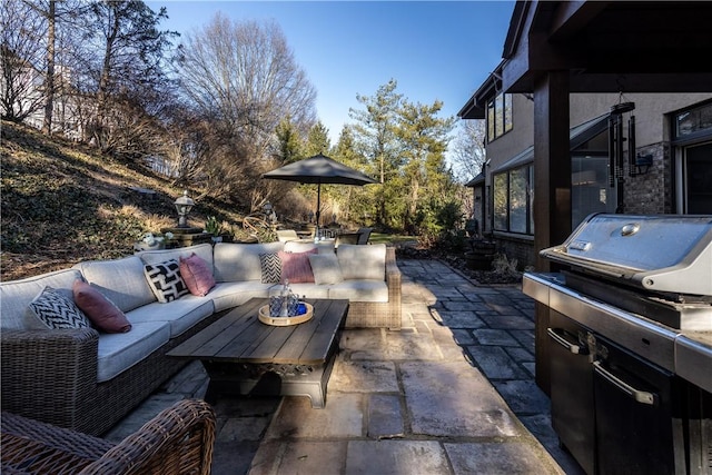 view of patio / terrace featuring outdoor dining space, area for grilling, and an outdoor hangout area