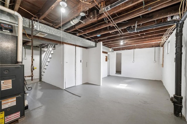 unfinished basement with stairway