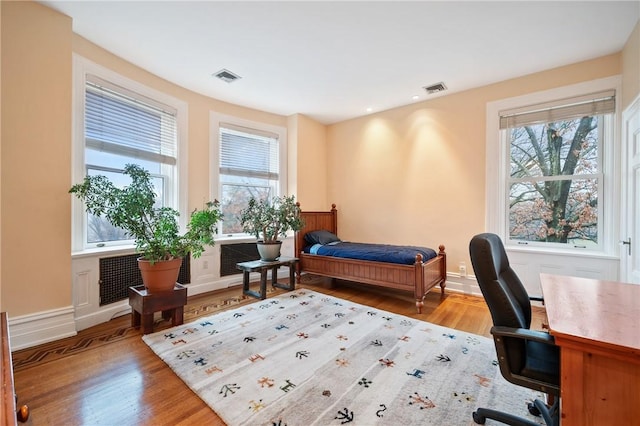 5435 Dunmoyle St, Squirrel Hill, PA 15217 - bedroom with multiple windows, wood finished floors, a desk, baseboards, and recessed lighting