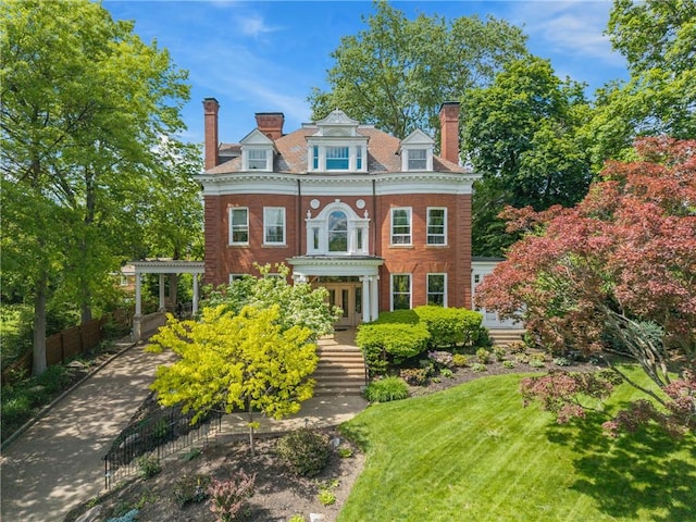 5435 Dunmoyle St, Squirrel Hill, PA 15217 - colonial-style house featuring a chimney and french doors