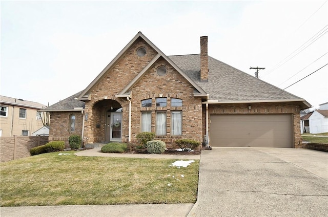 view of front of home with driveway, fence, a garage, brick siding, and a chimney