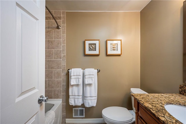 full bathroom with vanity, toilet, and visible vents