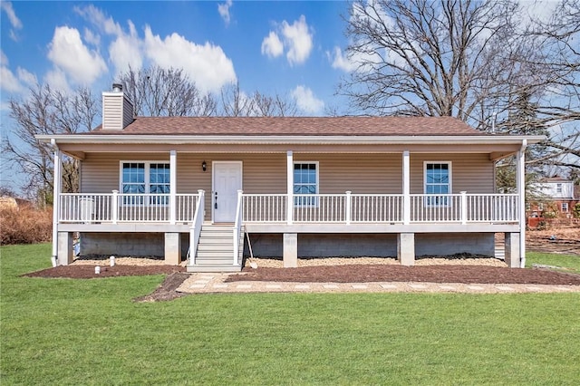 ranch-style house with a front lawn, covered porch, a chimney, and a shingled roof